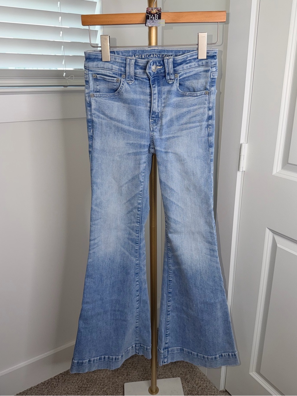 48. American Eagle Ne(x)t Level Festival Flare Jeans Light Wash
